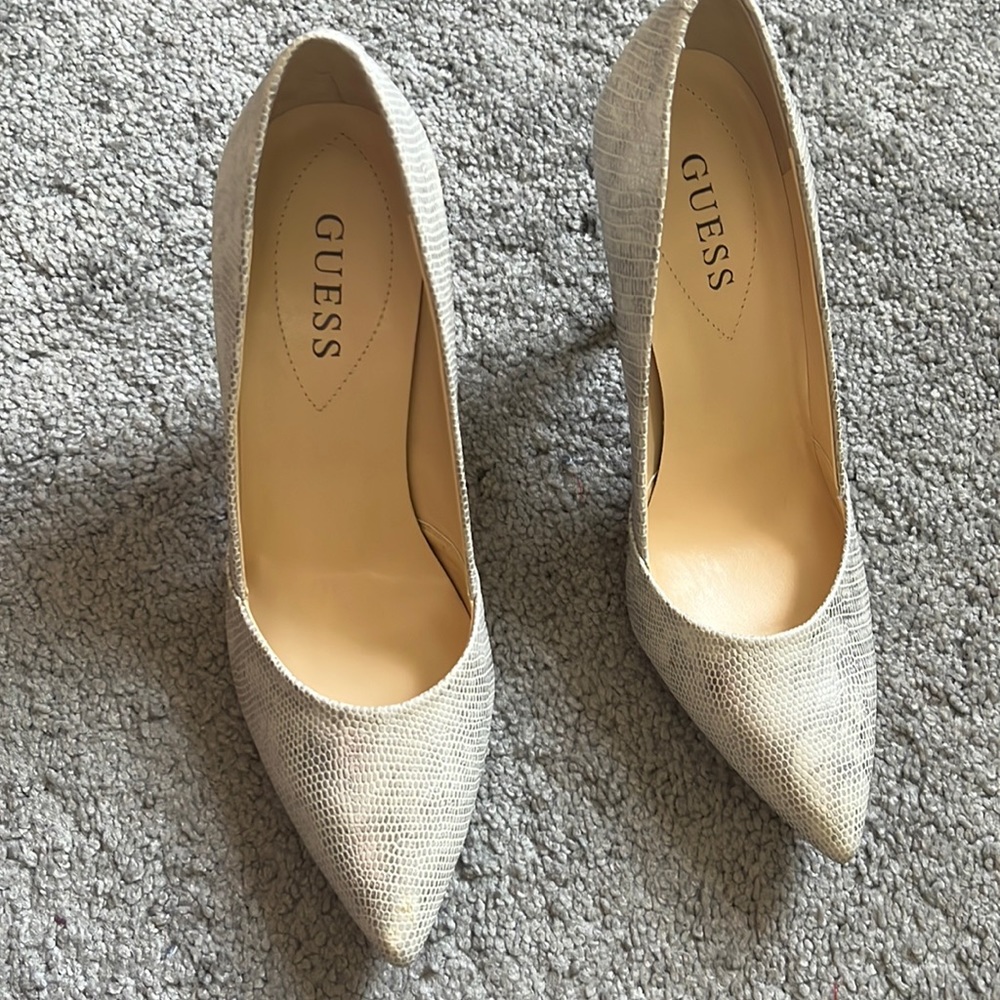 Heels. Brand new never worn. Small imperfection on one of the tips.